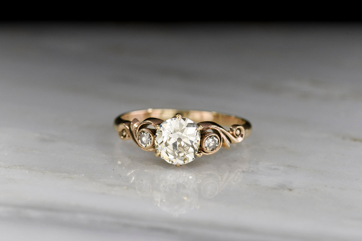 Early 1900s Art Nouveau Diamond Engagement Ring with Unique Scrollwork Shoulders
