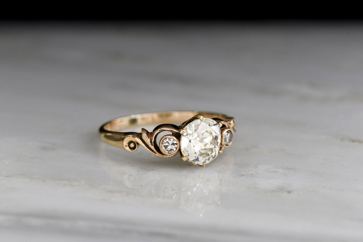 Early 1900s Art Nouveau Diamond Engagement Ring with Unique Scrollwork Shoulders