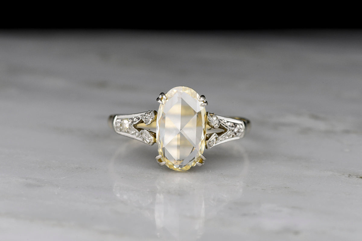 Fancy Yellow Oval Rose Cut Diamond Engagement Ring in Gold and Platinum