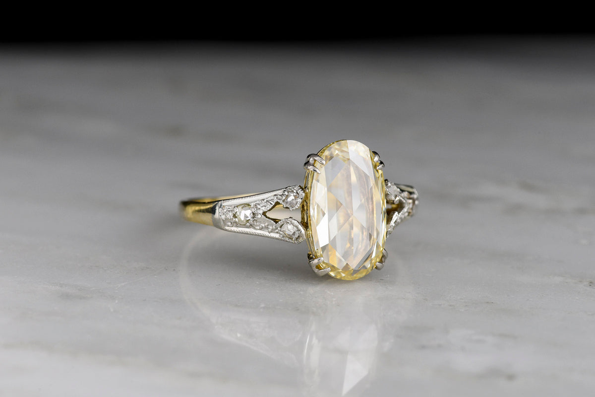 Fancy Yellow Oval Rose Cut Diamond Engagement Ring in Gold and Platinum