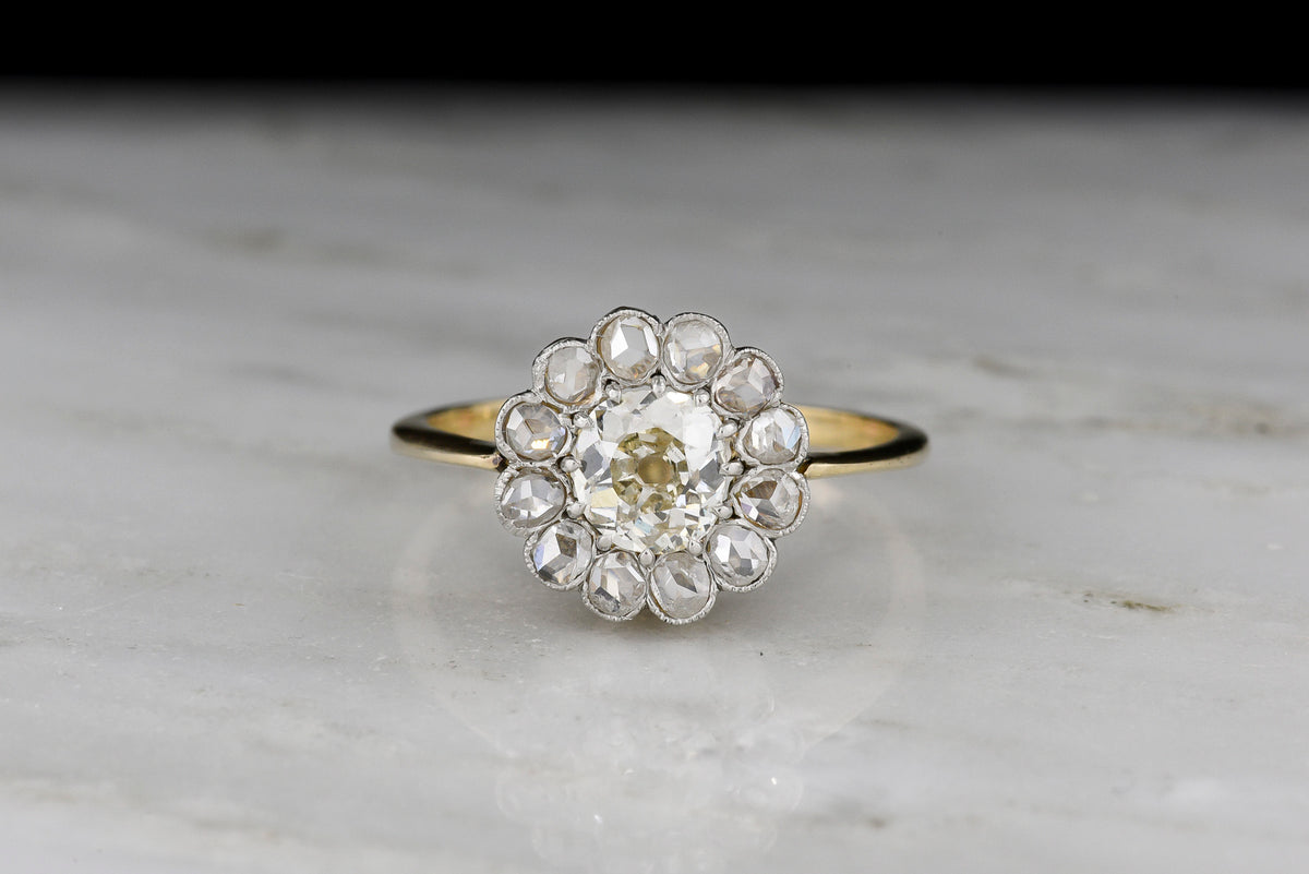 Edwardian Floral Cluster Engagement Ring with an Old Mine Cut Center and Rose Cut Accents