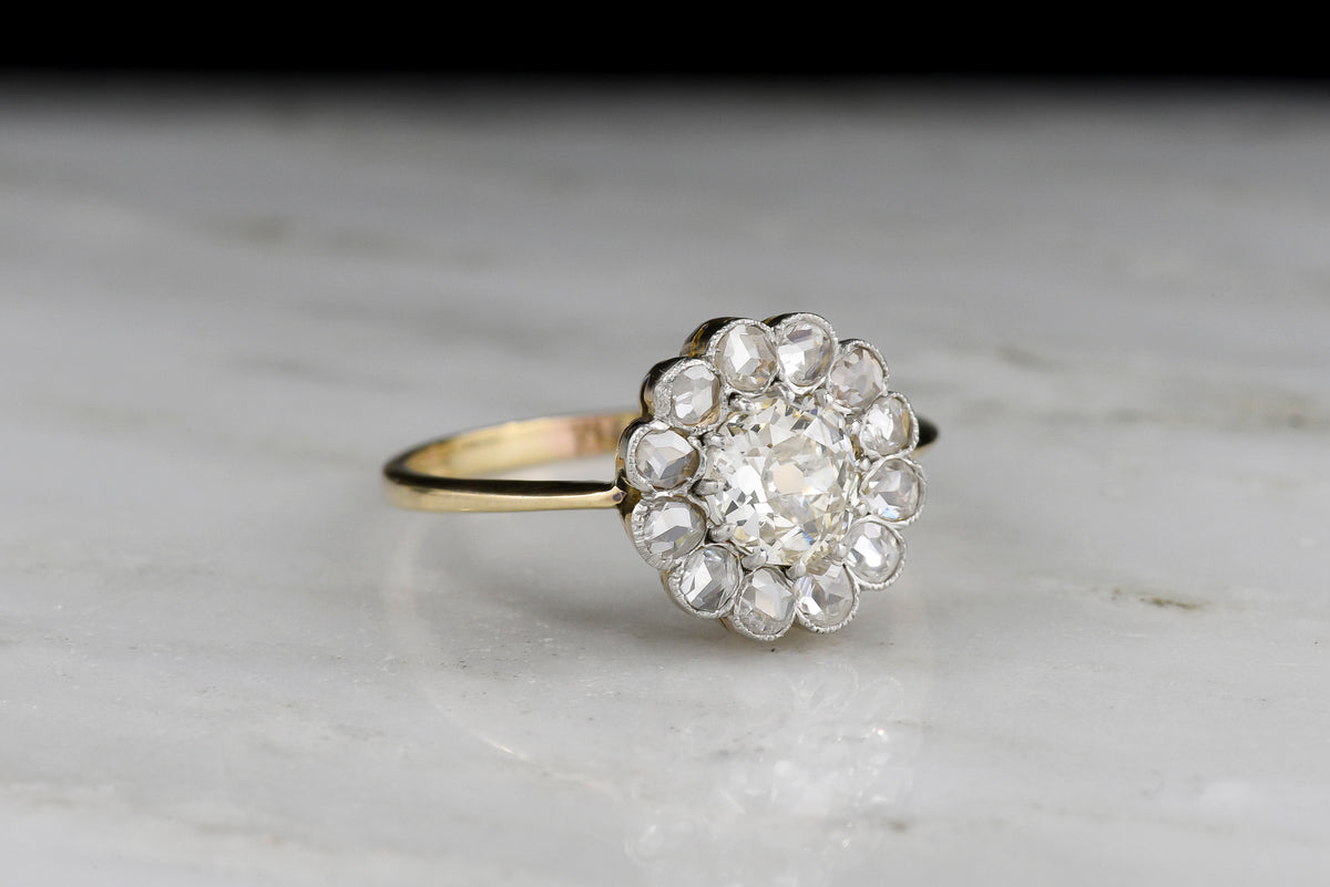 Edwardian Floral Cluster Engagement Ring with an Old Mine Cut Center and Rose Cut Accents