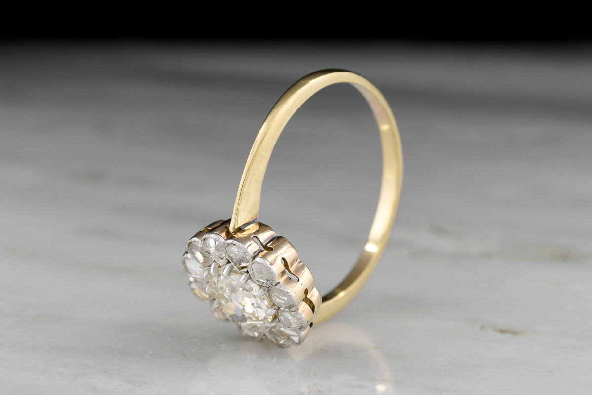 Edwardian Floral Cluster Engagement Ring with an Old Mine Cut Center and Rose Cut Accents
