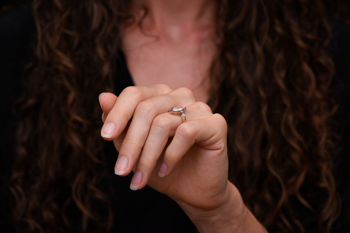 Shauna&#39;s Secret Stash: c. Early 1900s Belle Époque Two-Tone Ring with a Floating Marquise Cut Diamond and Ruby Surround