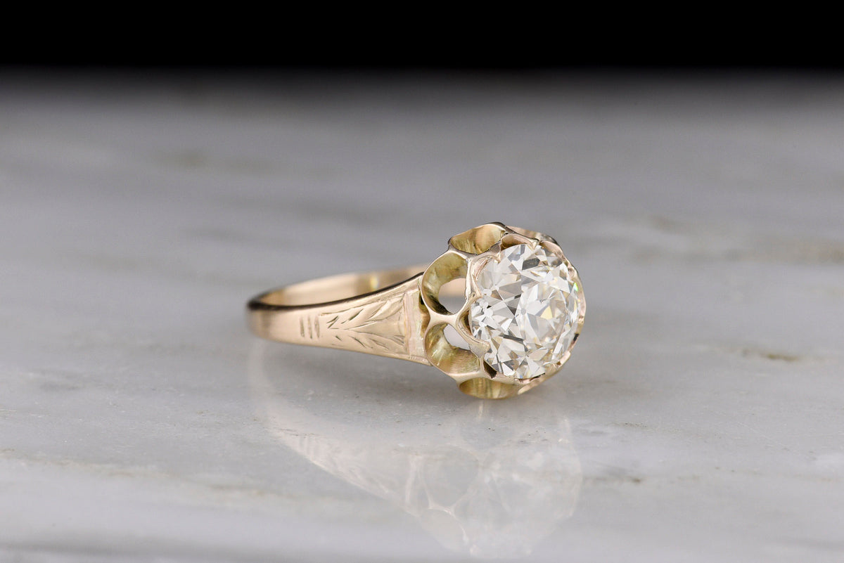 c. Early 1900s Post-Victorian Solitaire Engagement Ring with a Unique Double-Buttercup Design