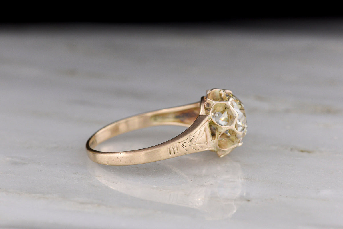 c. Early 1900s Post-Victorian Solitaire Engagement Ring with a Unique Double-Buttercup Design
