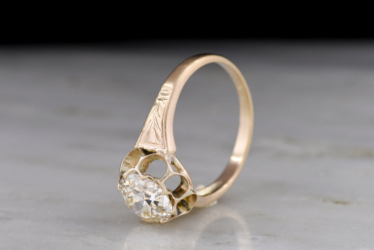 c. Early 1900s Post-Victorian Solitaire Engagement Ring with a Unique Double-Buttercup Design