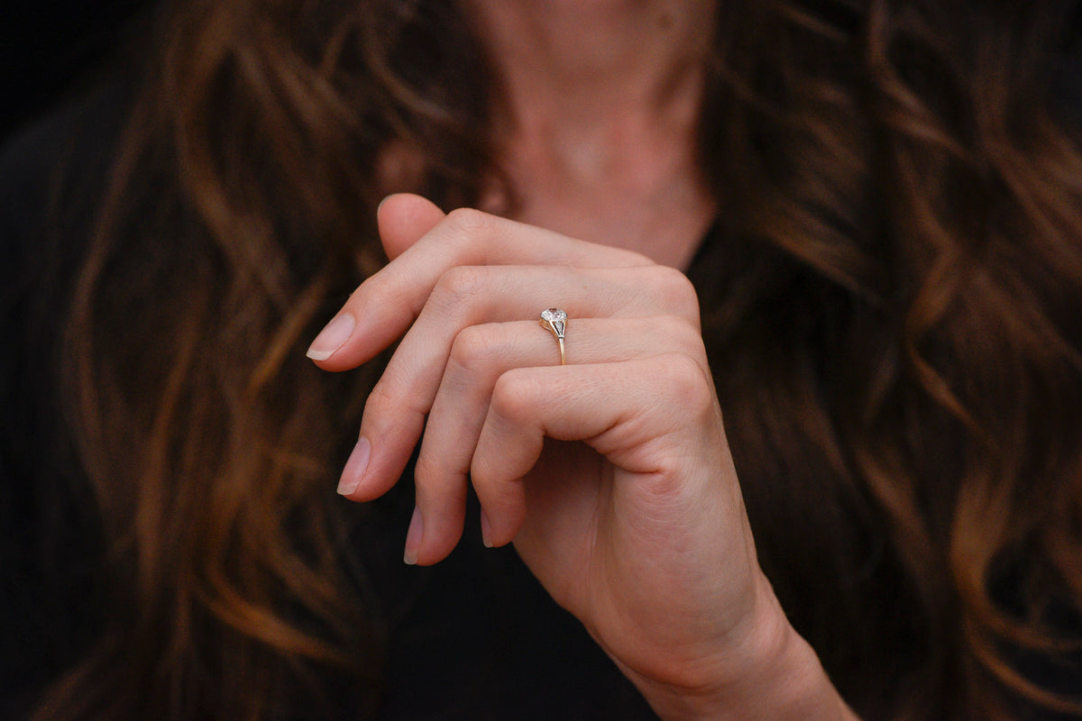 Belle Époque Gold and Platinum Diamond Ring with Open Metalwork Shoulders and Engraving