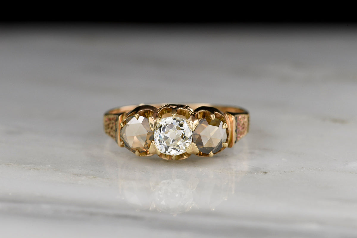 1868 Gold and Black Enamel Three-Stone Ring with Chocolate-Hued Rose Cut Diamonds