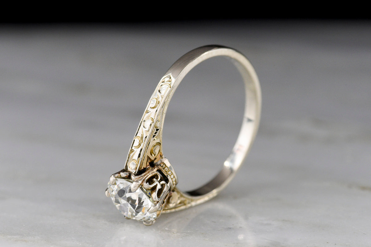 Unique Warm-White Gold Solitaire Engagement Ring with Intricate Engraving