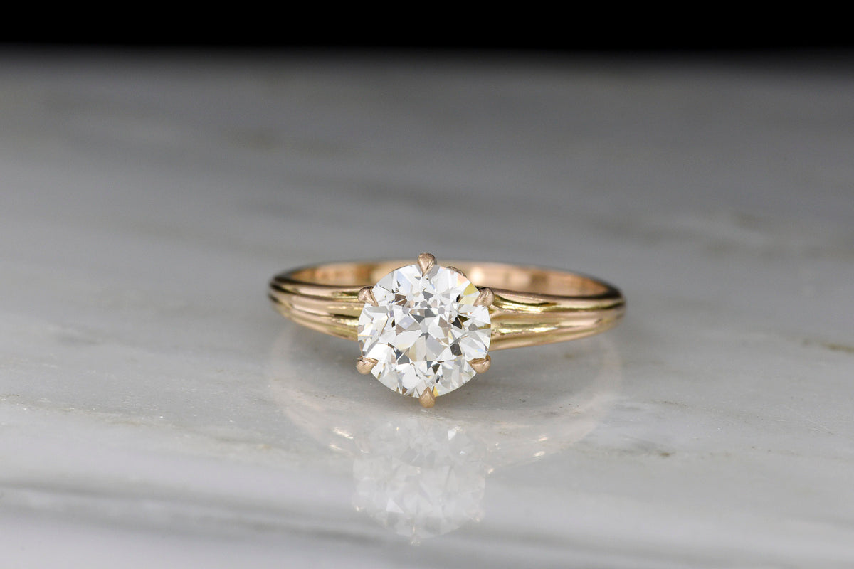 c. Early-1900s Post-Victorian Transitional Cut Solitaire Engagement Ring with Fluted Shoulders
