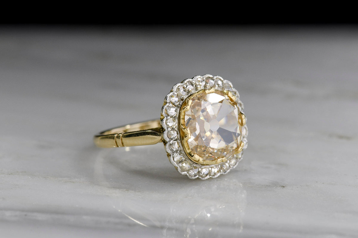 c. 1900 Belle Époque Two-Tone Ring Cluster Ring with a Light Brown Old Mine Cut Diamond Center