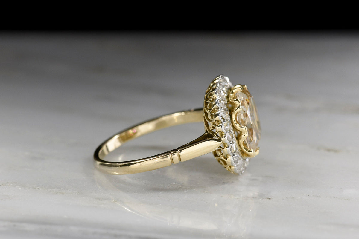 c. 1900 Belle Époque Two-Tone Ring Cluster Ring with a Light Brown Old Mine Cut Diamond Center