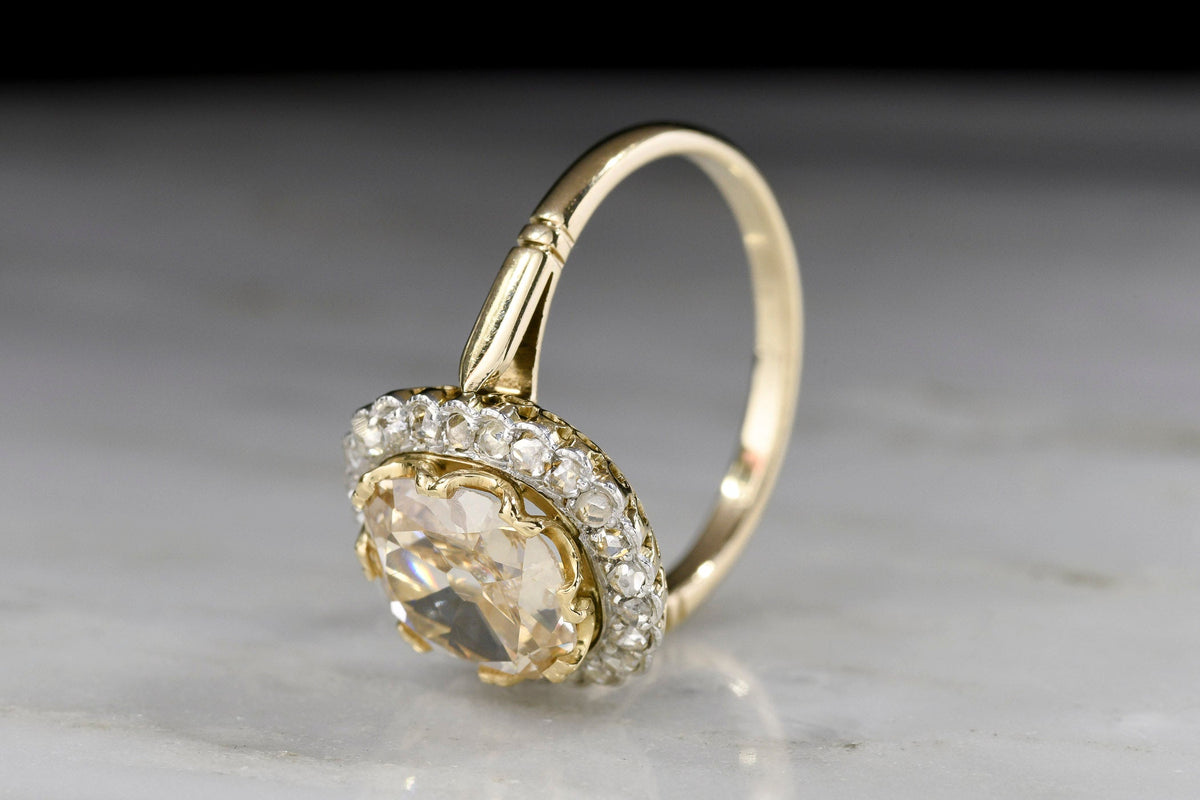 c. 1900 Belle Époque Two-Tone Ring Cluster Ring with a Light Brown Old Mine Cut Diamond Center