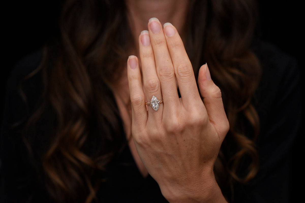 RESERVED!!! Vintage Navette Ring with a Unique Oval Step-Cut Diamond Center