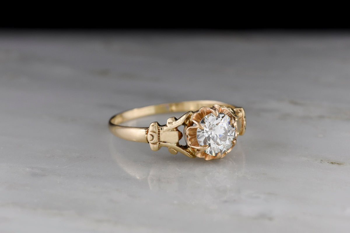 c. 1900 Buttercup Solitaire Engagement Ring with Unique Capital Shoulders