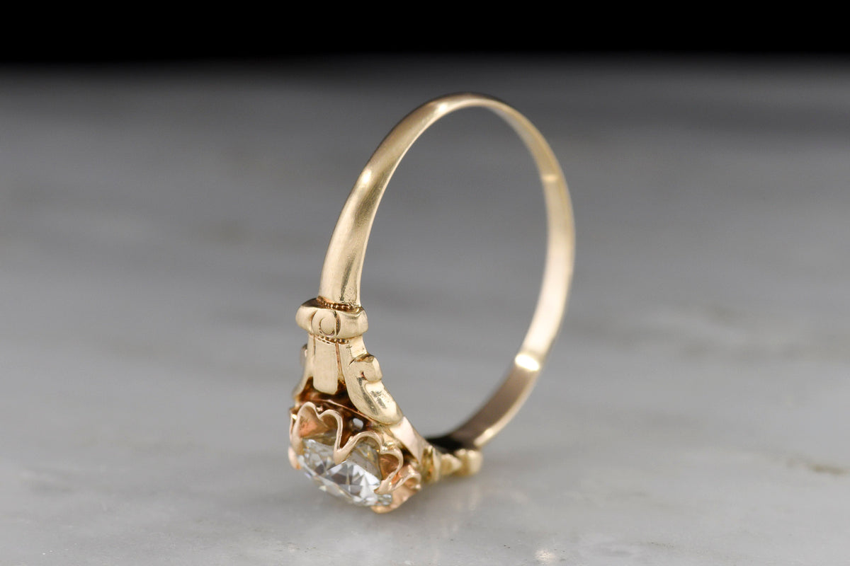 c. 1900 Buttercup Solitaire Engagement Ring with Unique Capital Shoulders