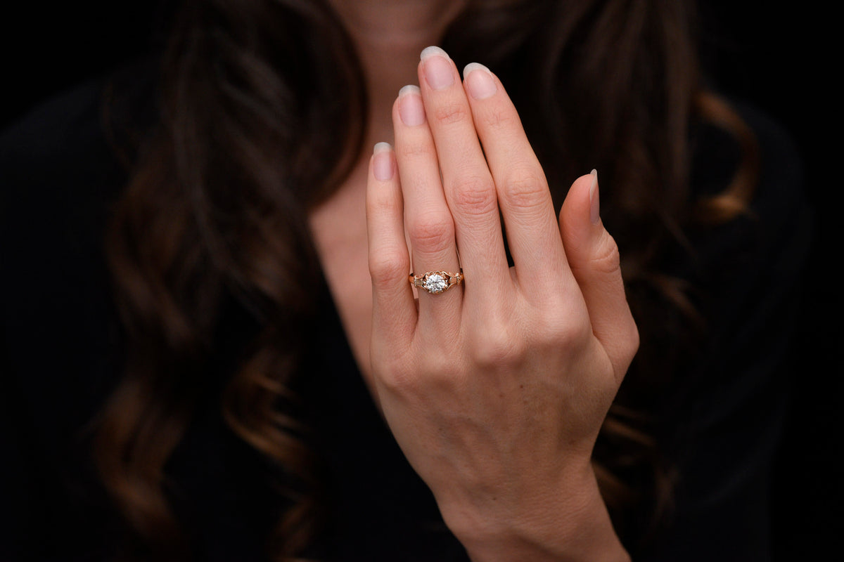 c. 1900 Buttercup Solitaire Engagement Ring with Unique Capital Shoulders