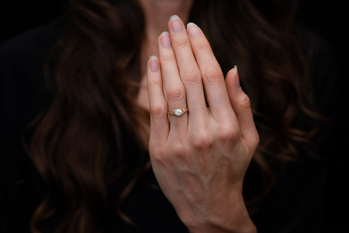 c. 1900 Late-Victorian Engagement Ring with Hand-Carved Shoulders and a GIA Old European Cut Center