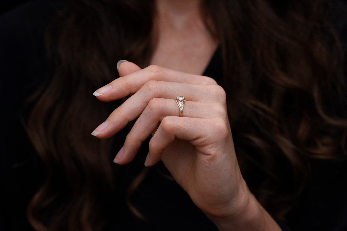 c. 1900 Late-Victorian Engagement Ring with Hand-Carved Shoulders and a GIA Old European Cut Center