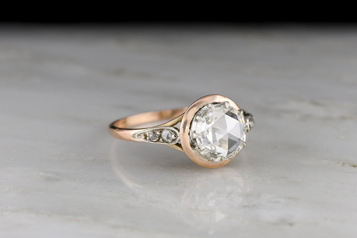 c. 1890s Victorian Two-Tone Engagement Ring with a Silver Top and Round Rose Cut Diamond