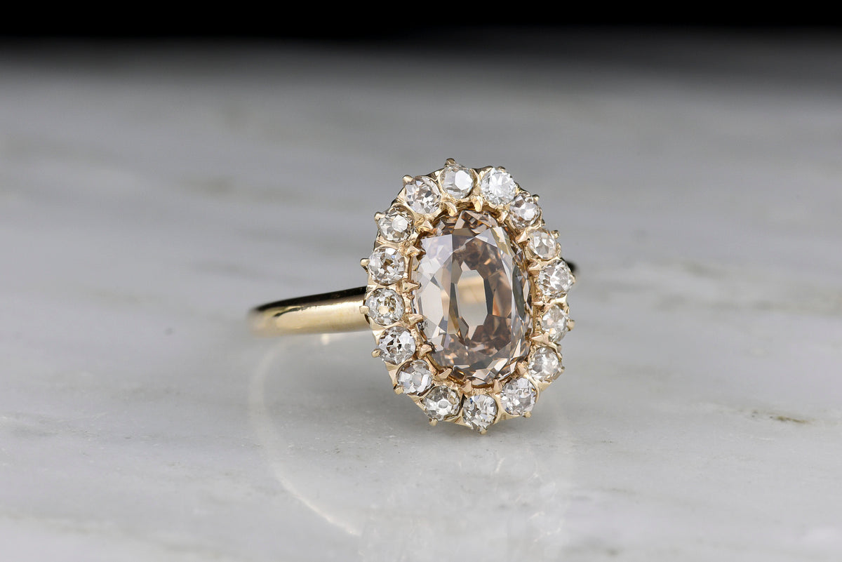 c. Late 1800s - Early 1900s Chunky Fancy Brown Antique Oval Cut Diamond Cluster Ring