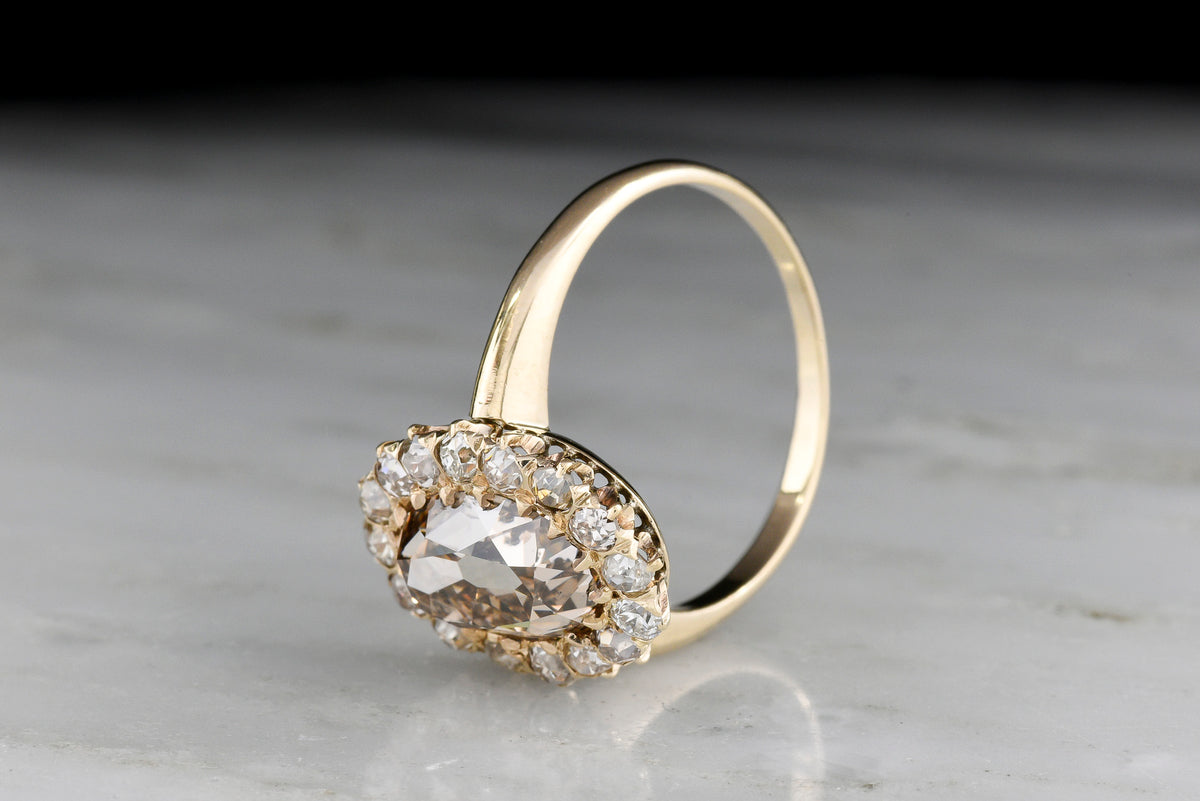 c. Late 1800s - Early 1900s Chunky Fancy Brown Antique Oval Cut Diamond Cluster Ring