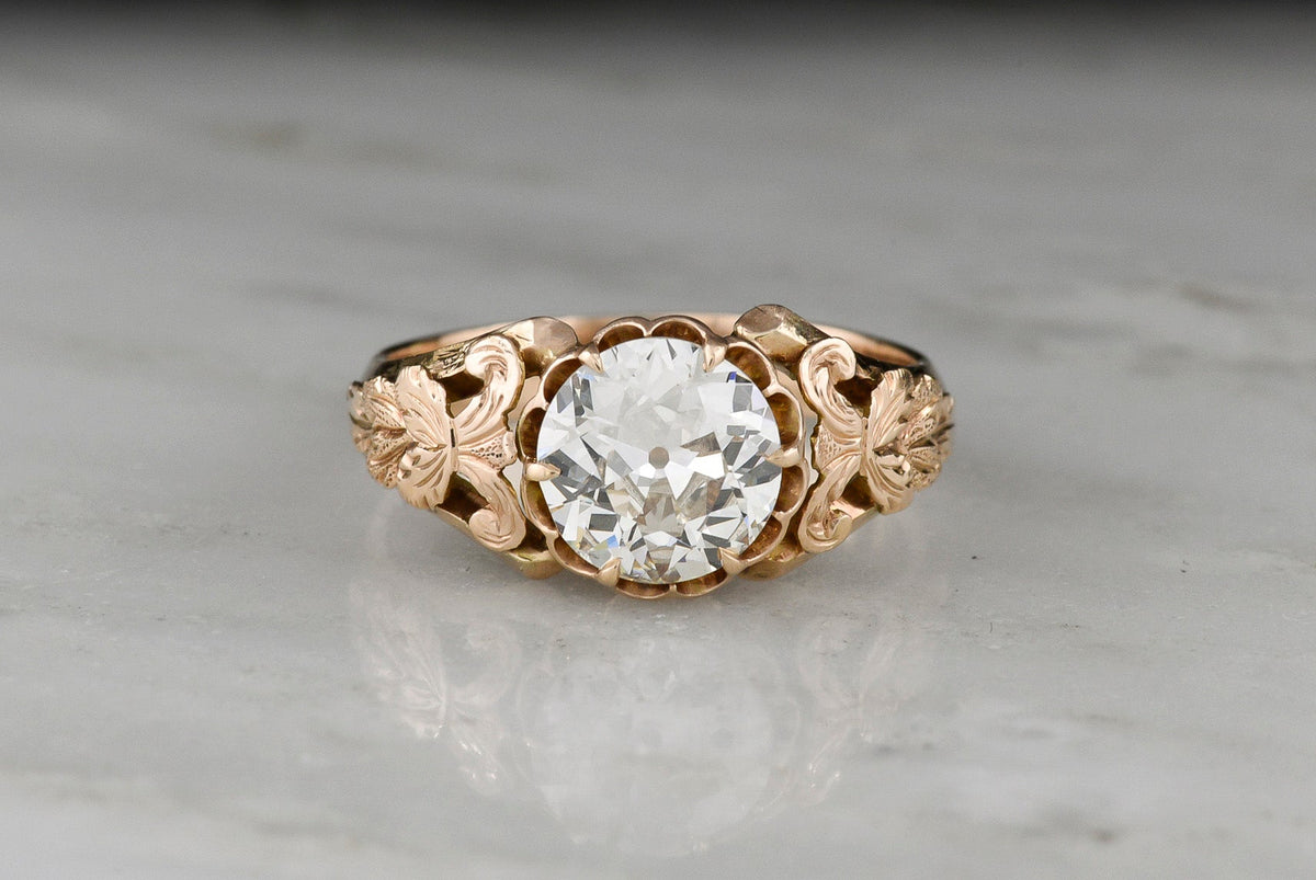 Handmade Victorian-Era Engagement Ring with a Carved Nature Motif in the Shoulders