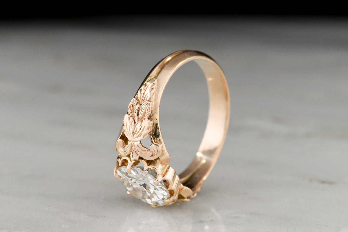 Handmade Victorian-Era Engagement Ring with a Carved Nature Motif in the Shoulders