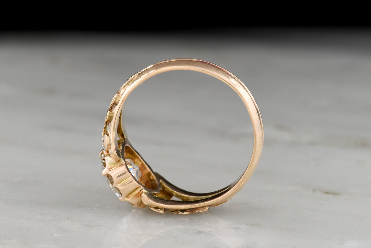 Handmade Victorian-Era Engagement Ring with a Carved Nature Motif in the Shoulders