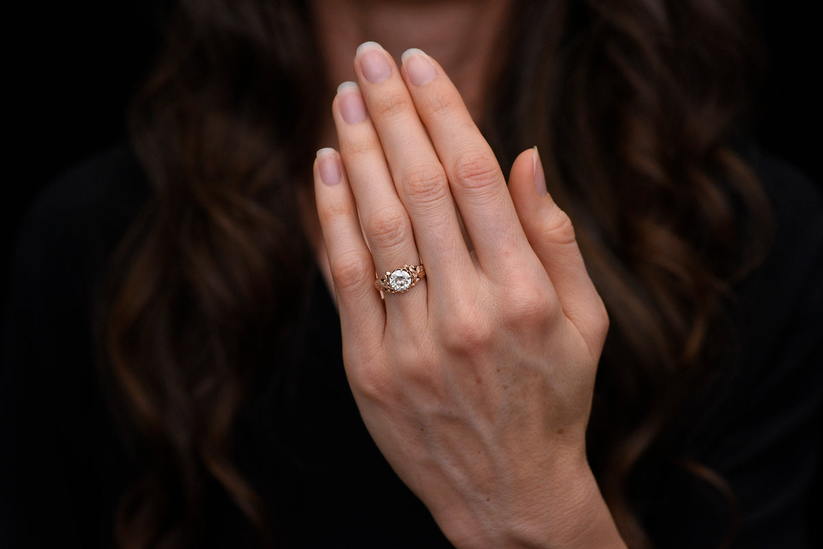 Handmade Victorian-Era Engagement Ring with a Carved Nature Motif in the Shoulders