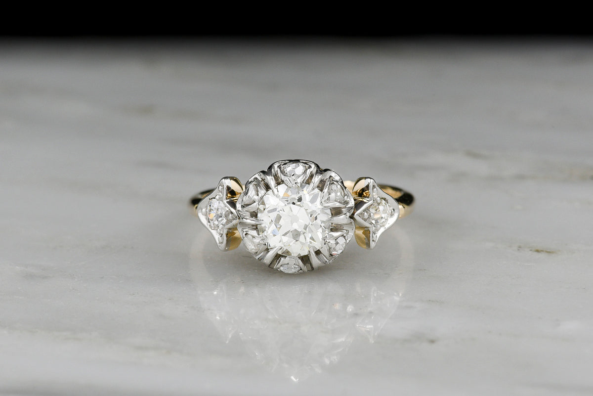 Edwardian / Belle Époque / Gilded Age Engagement Ring in Gold and Platinum with Floral Design Motifs