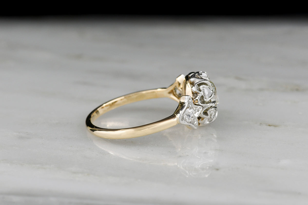 Edwardian / Belle Époque / Gilded Age Engagement Ring in Gold and Platinum with Floral Design Motifs