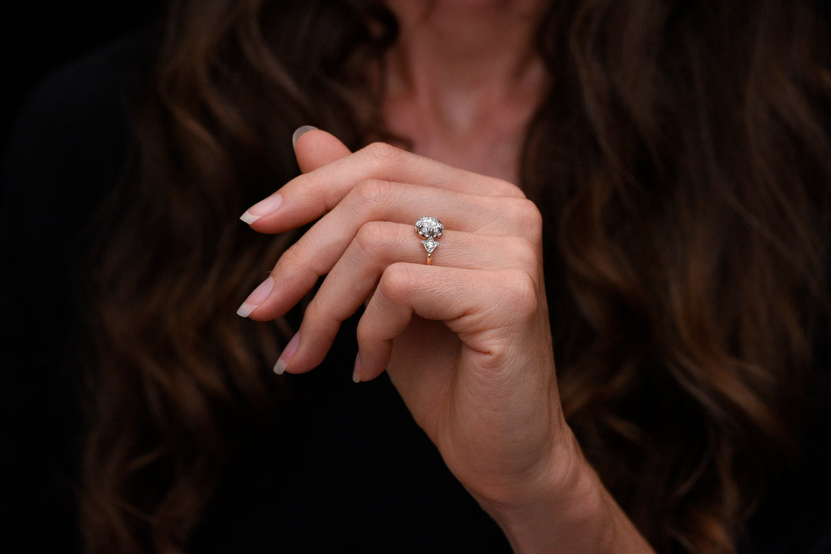 Edwardian / Belle Époque / Gilded Age Engagement Ring in Gold and Platinum with Floral Design Motifs