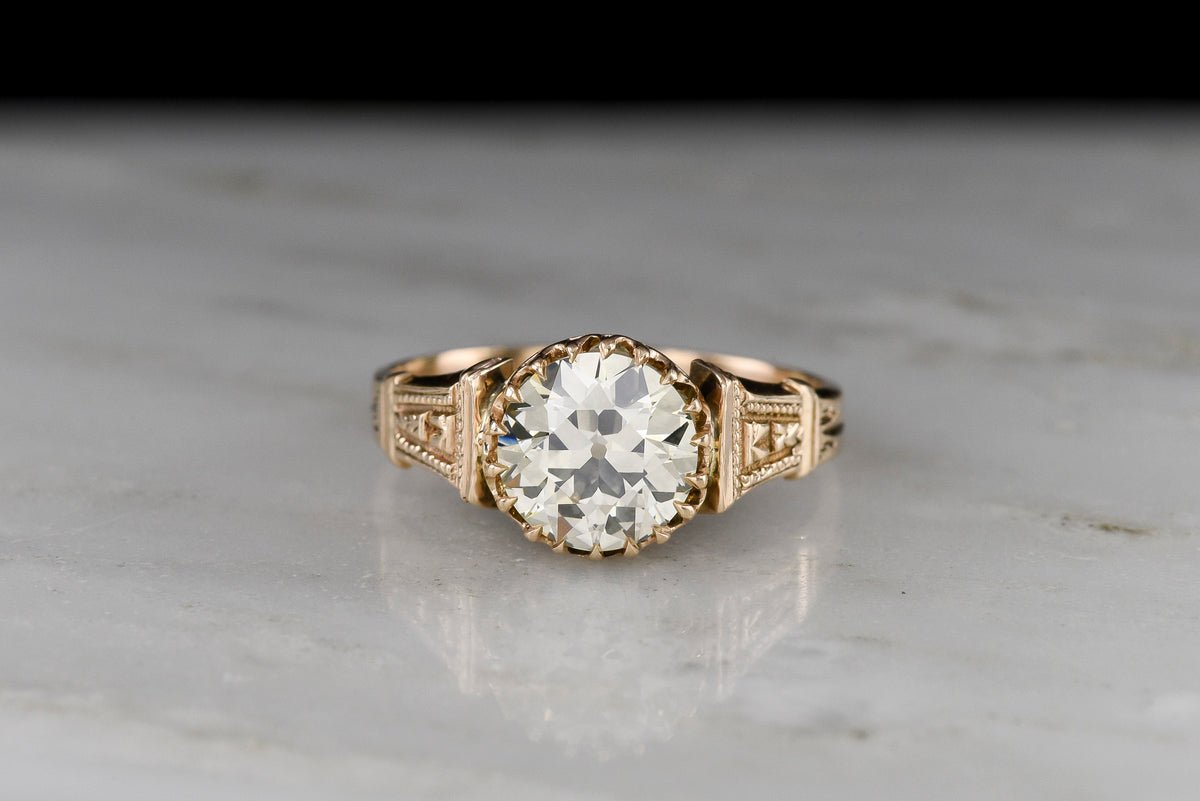 Victorian Engagement Ring with a Floating Basket and Intricate Shoulders