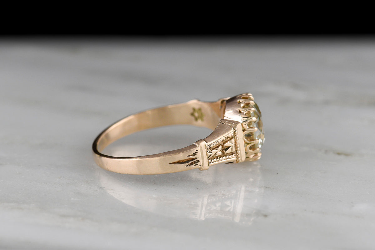 Victorian Engagement Ring with a Floating Basket and Intricate Shoulders