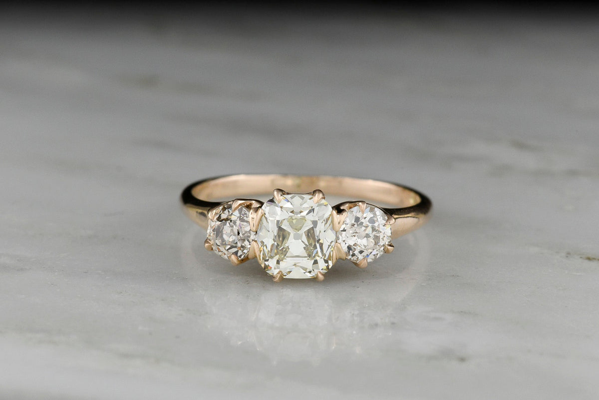 Late/Post-Victorian Three-Stone Engagement Ring with an Old Mine Cut Diamond Center