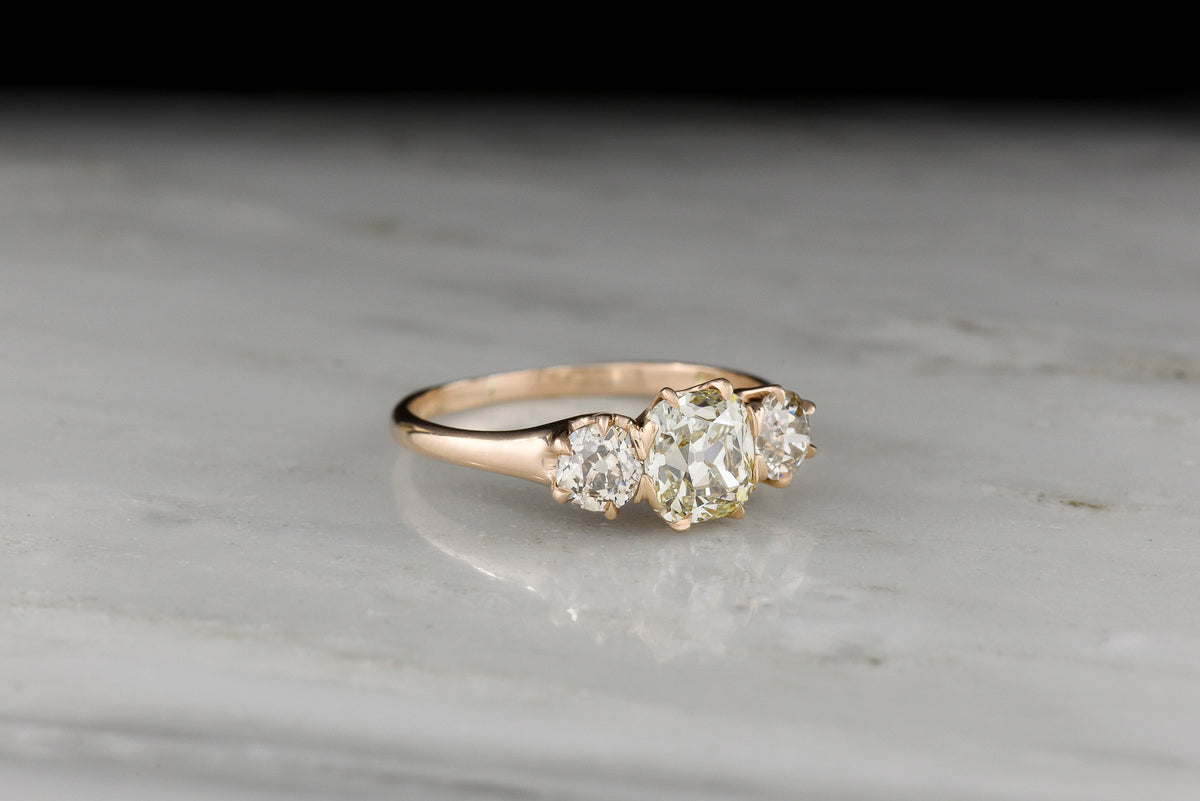Late/Post-Victorian Three-Stone Engagement Ring with an Old Mine Cut Diamond Center