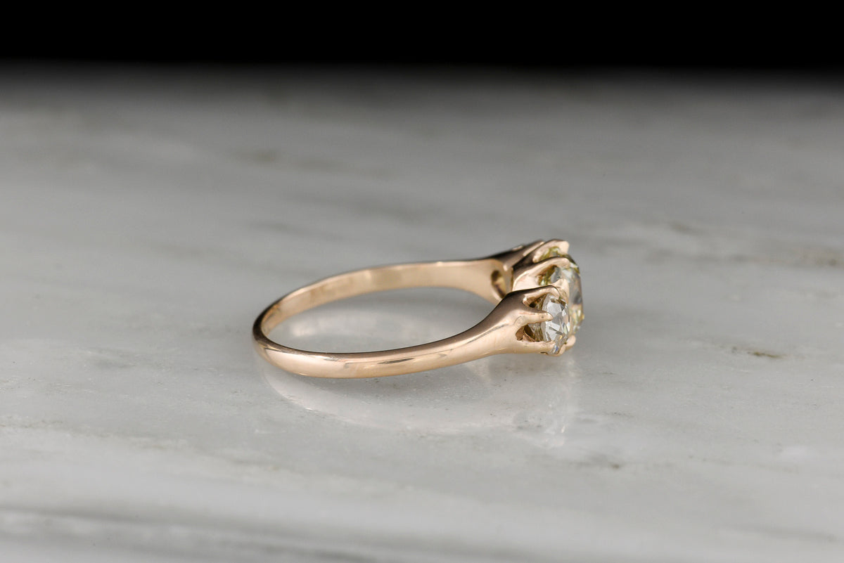 Late/Post-Victorian Three-Stone Engagement Ring with an Old Mine Cut Diamond Center