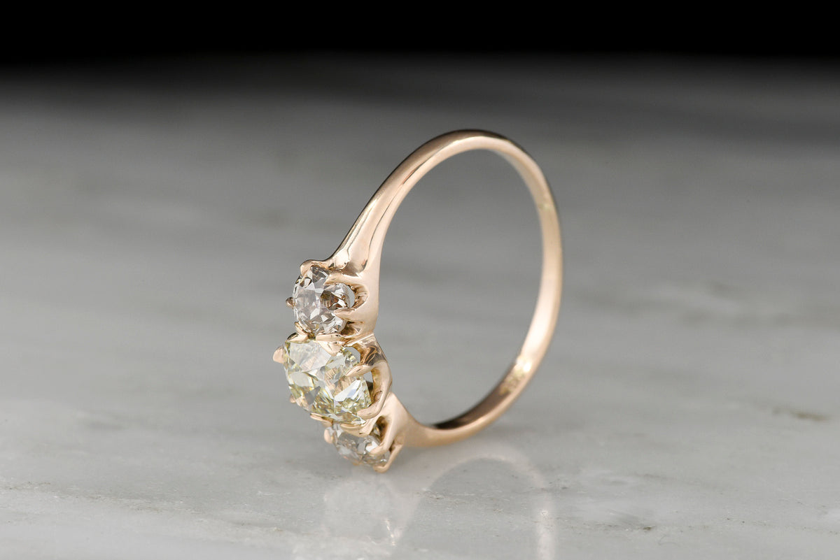 Late/Post-Victorian Three-Stone Engagement Ring with an Old Mine Cut Diamond Center