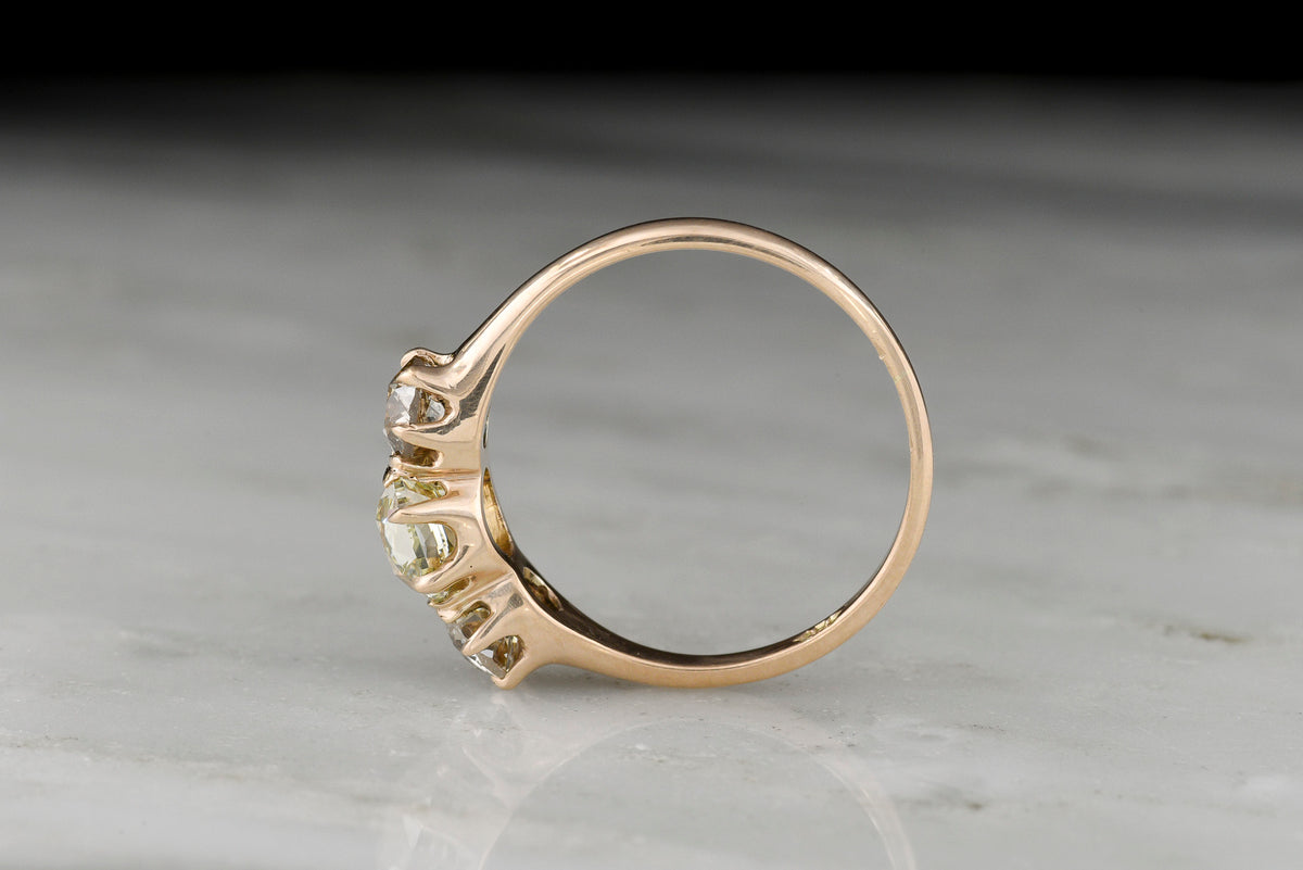 Late/Post-Victorian Three-Stone Engagement Ring with an Old Mine Cut Diamond Center