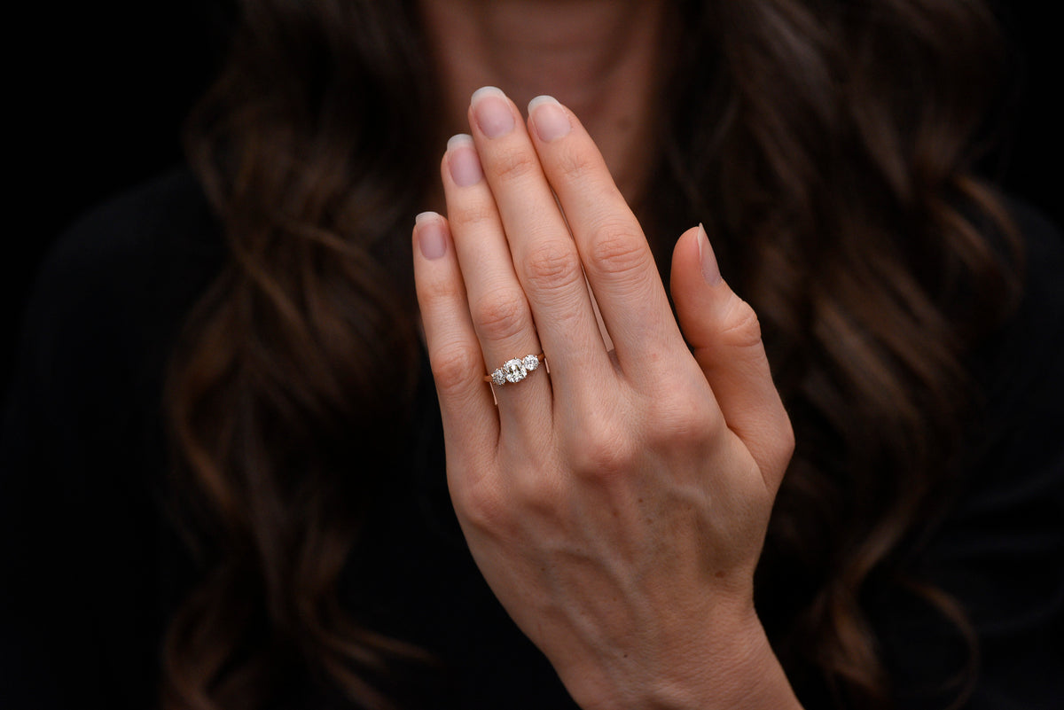 Late/Post-Victorian Three-Stone Engagement Ring with an Old Mine Cut Diamond Center