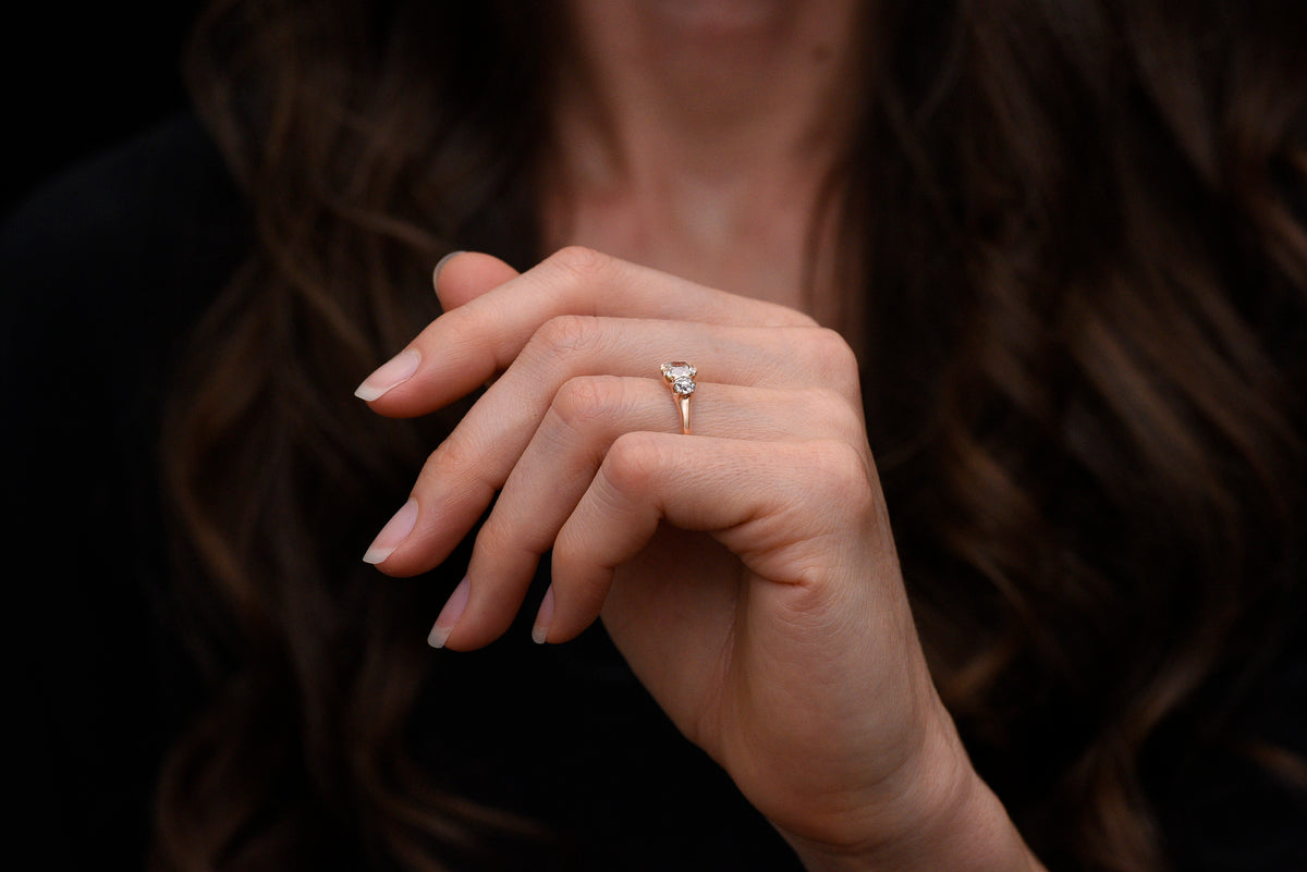 Late/Post-Victorian Three-Stone Engagement Ring with an Old Mine Cut Diamond Center
