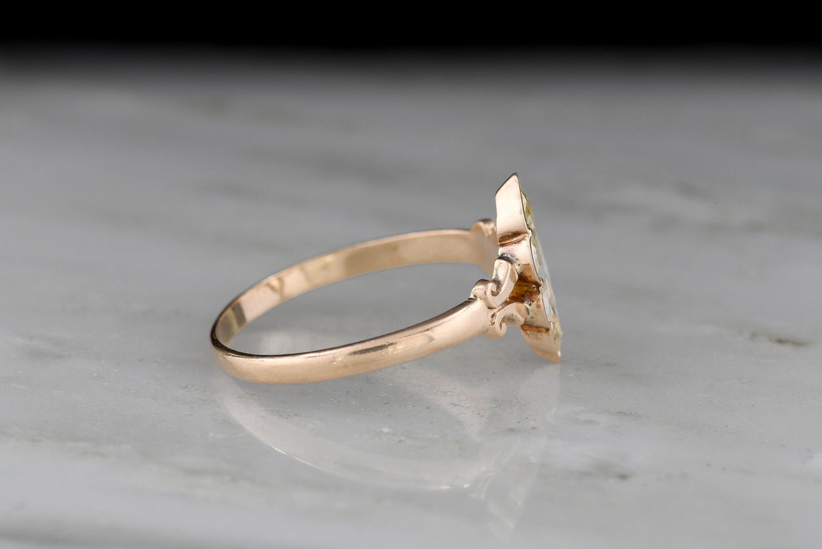 c. Early 1900s Gold Engagement Ring with a Marquise Cut Diamond and Subtle Split Shank