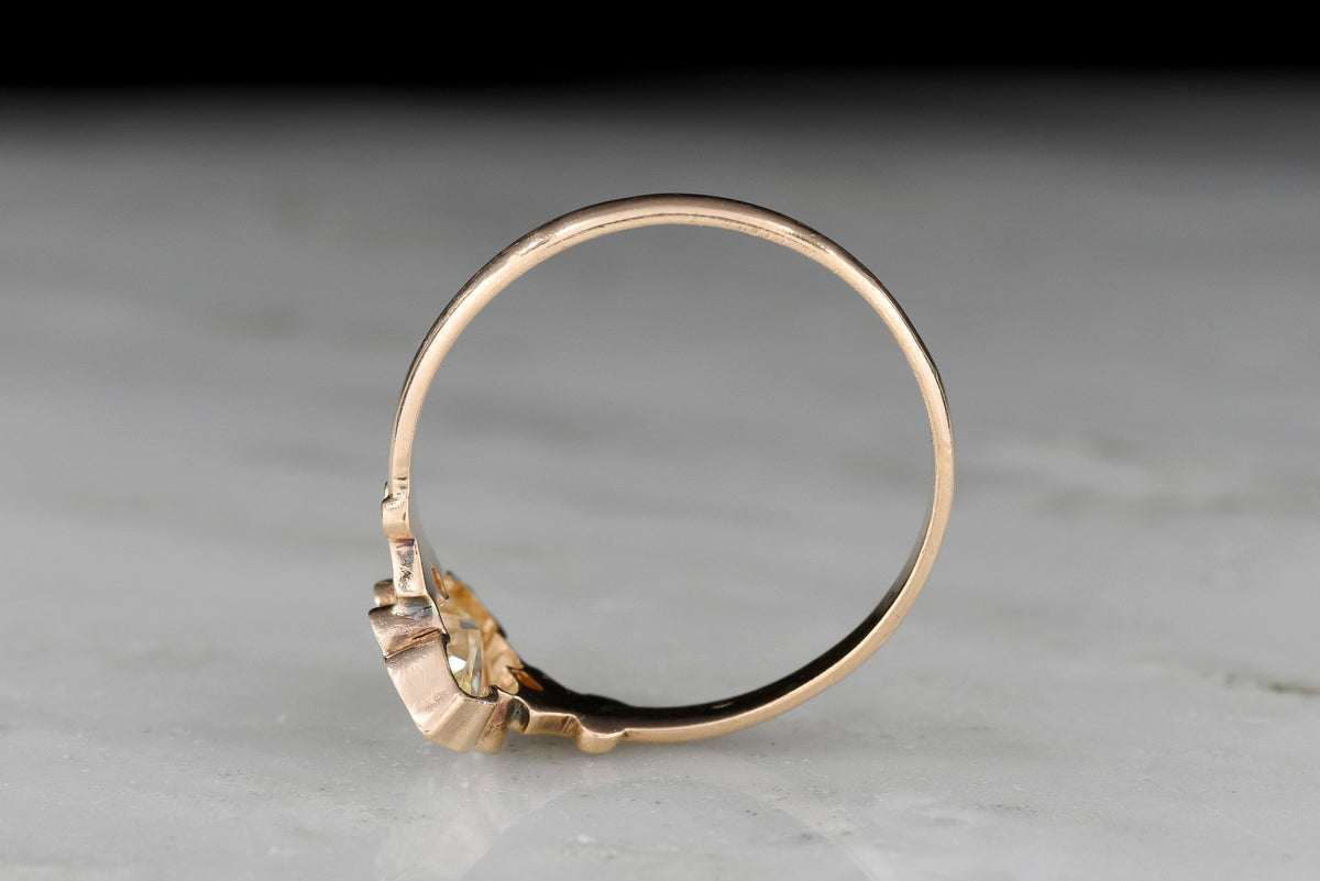 c. Early 1900s Gold Engagement Ring with a Marquise Cut Diamond and Subtle Split Shank