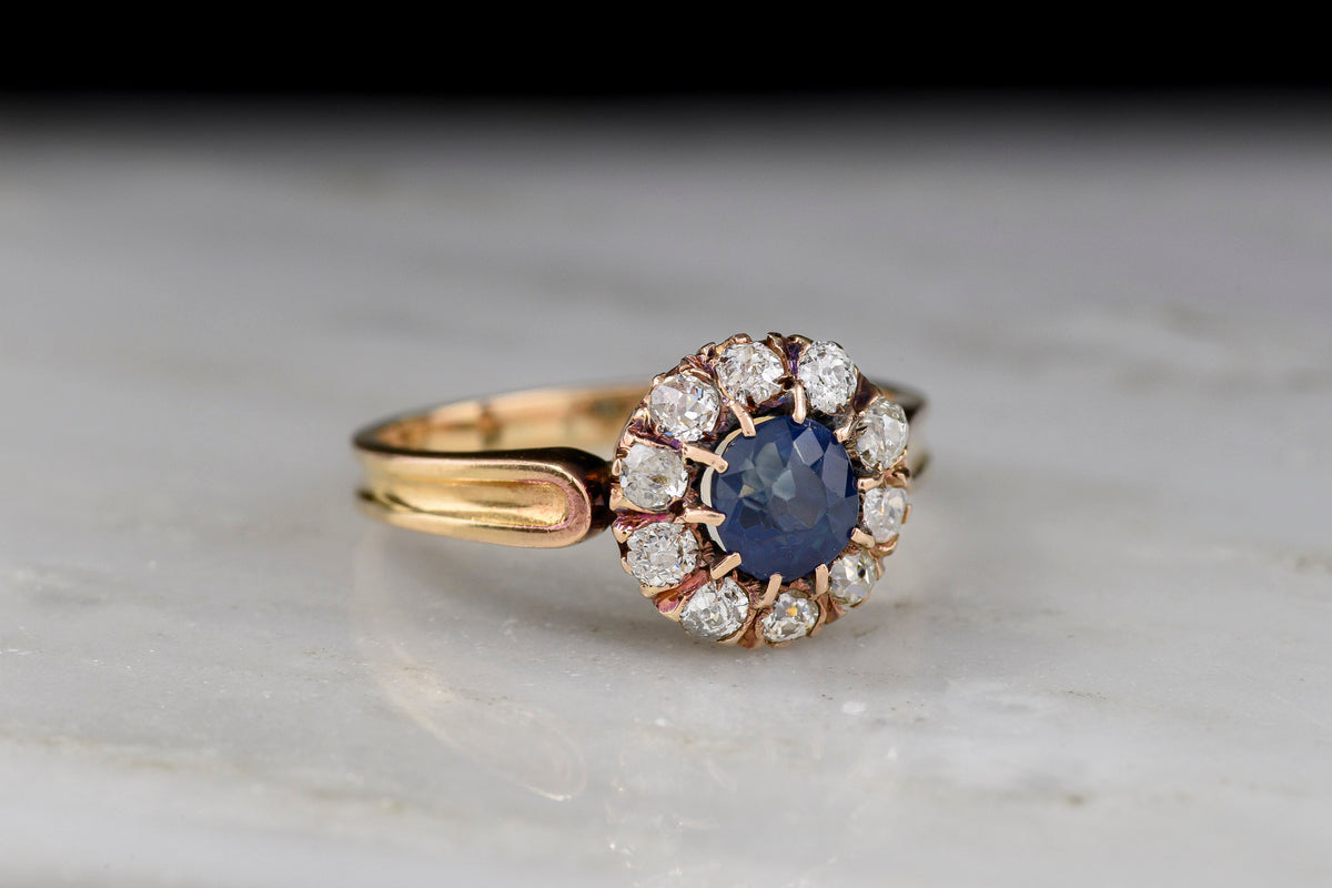 c. Late 1800s Gold Cluster Ring with a Sapphire Center and Diamond Surround