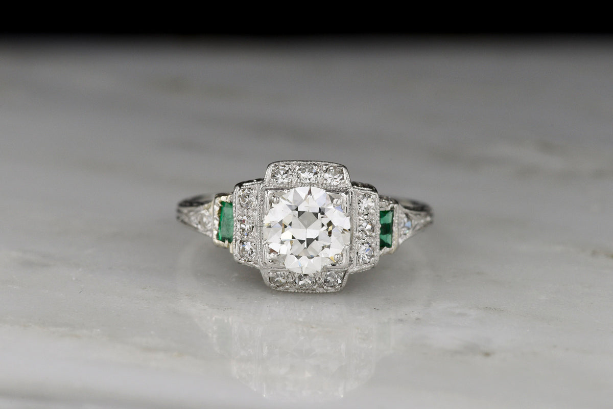 Art Deco Engagement Ring with Stepwise Graduation, Balustrade Gallery, and Emerald Accents