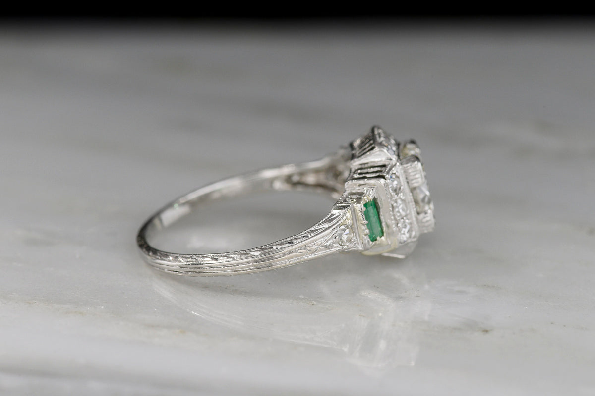 Art Deco Engagement Ring with Stepwise Graduation, Balustrade Gallery, and Emerald Accents