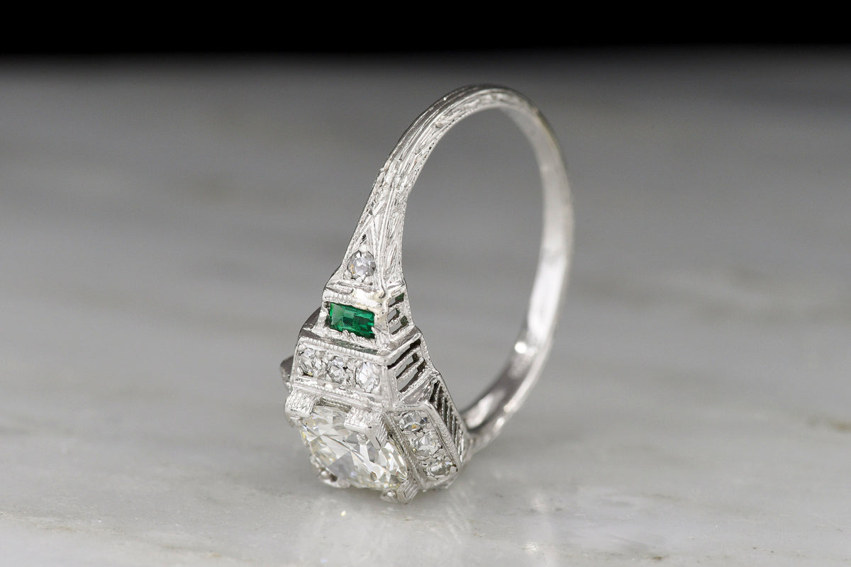 Art Deco Engagement Ring with Stepwise Graduation, Balustrade Gallery, and Emerald Accents