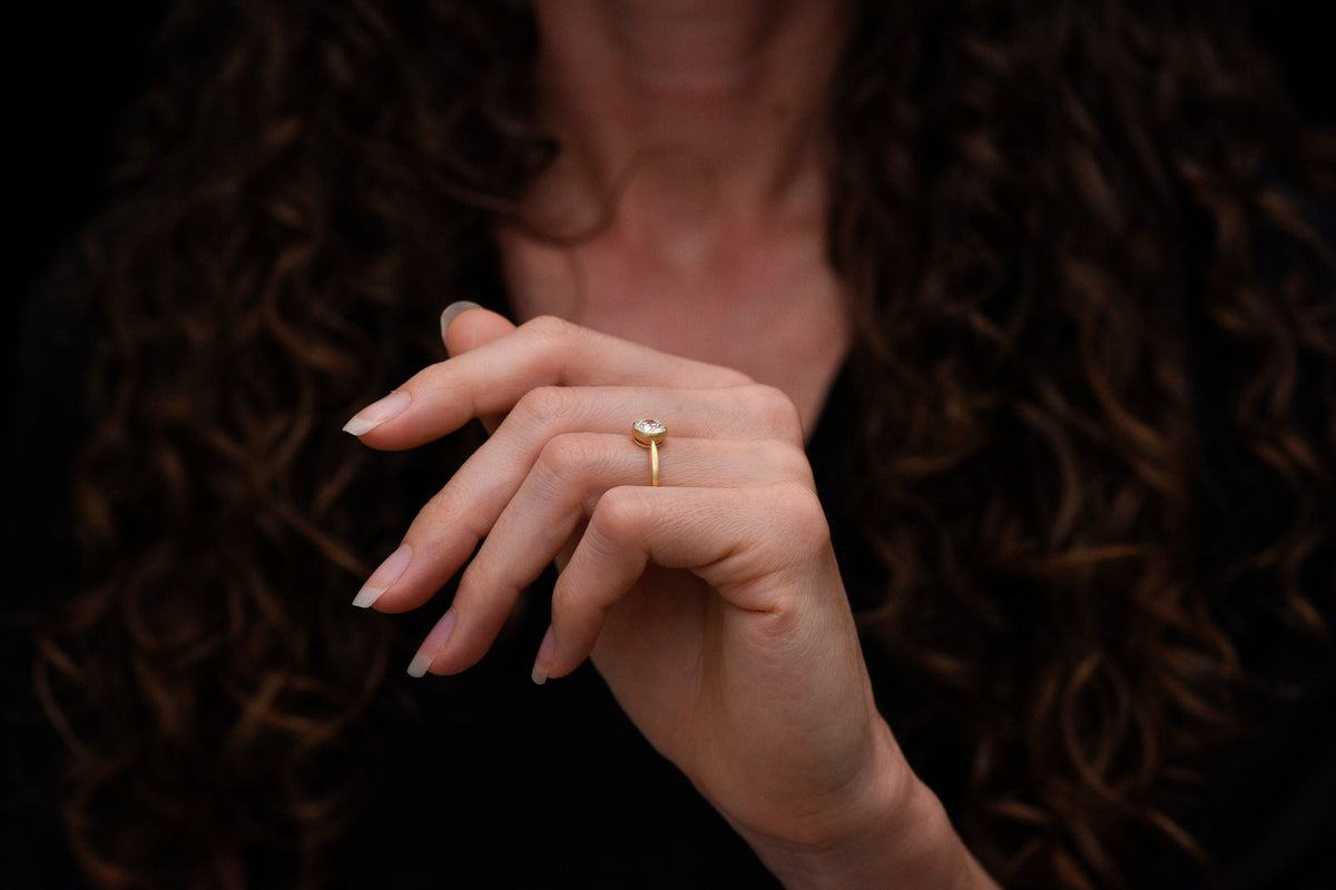 Pebble &amp; Polish Original: Classic Solitaire in 18K with a Rounded Top and Peek-a-Boo Basket